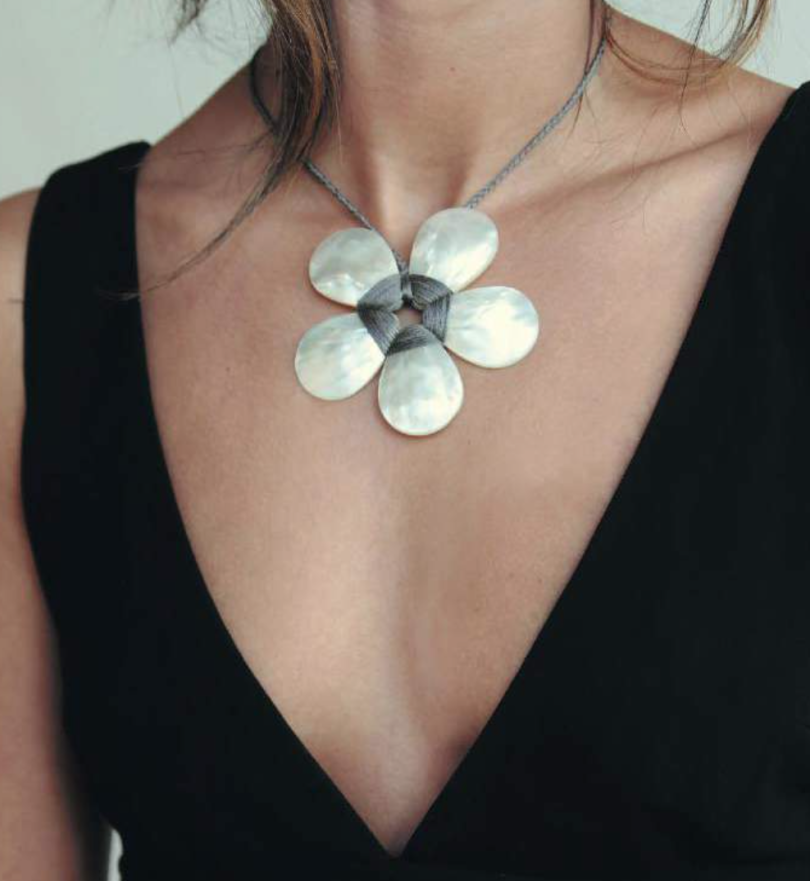 Large flower necklace of shell on grey cord