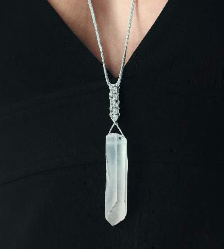 Pendant necklace of quartz on macramed light grey cord